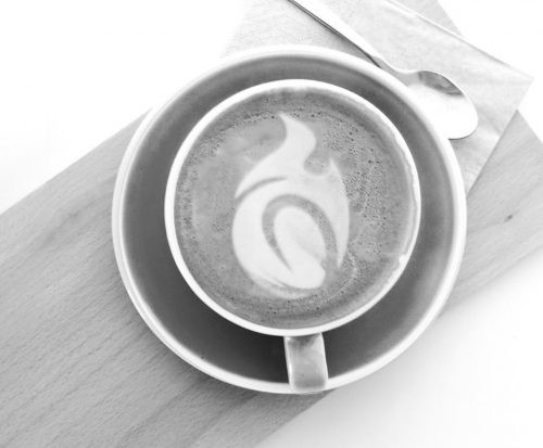 Dark Roast Media Emblem in Coffee Foam - Hero Image