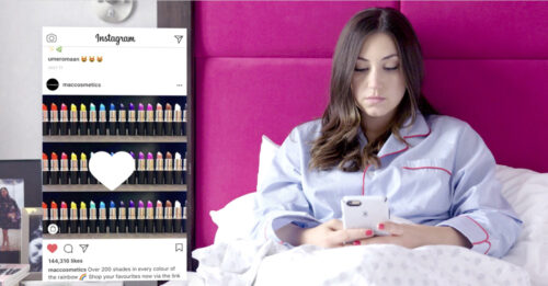 Estée Lauder - Screenshot Image - Woman in Bed Scrolling Through Catalogue